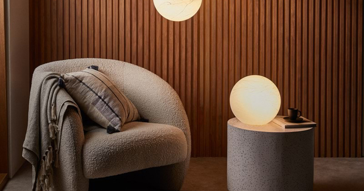 funky globe lamps in warm modern lounge.